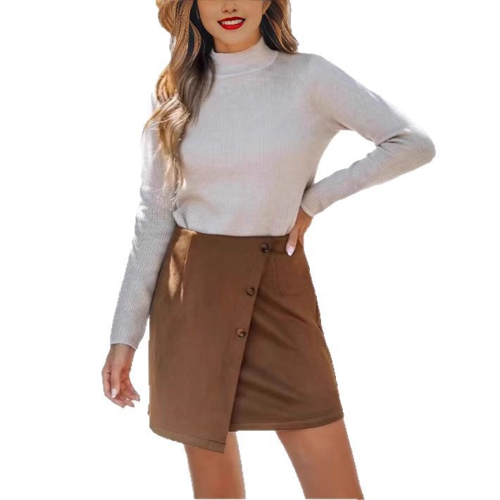 Jupe à taille haute irrégulière avec fermeture éclair et bouton détaillé