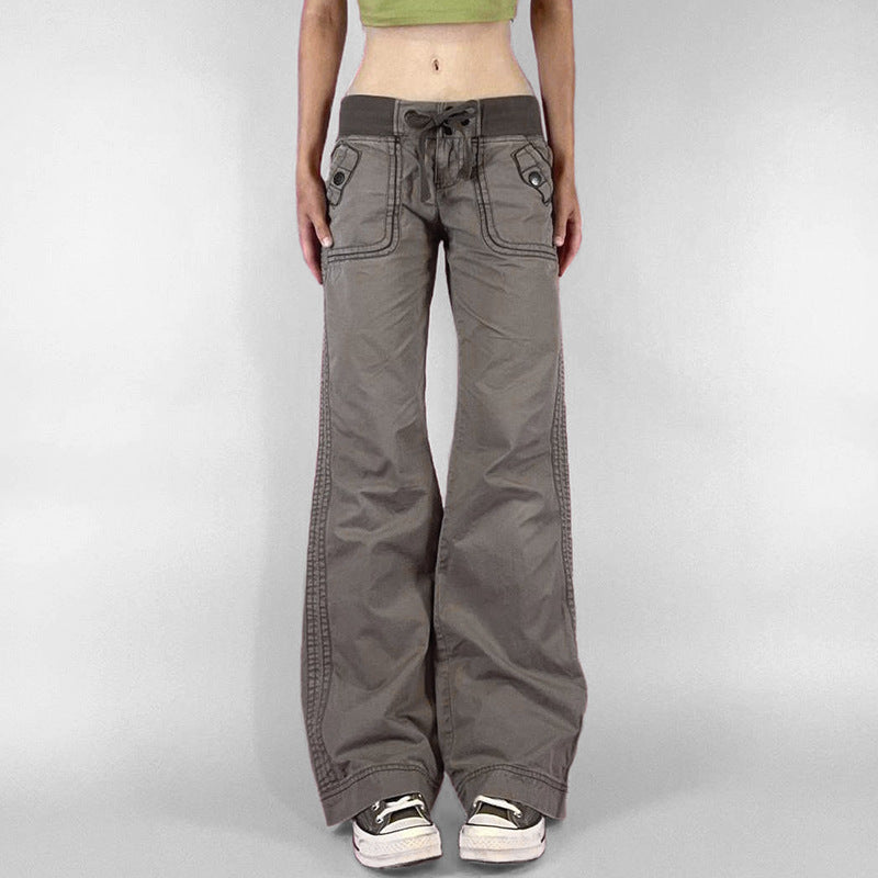 Jeans de perna de bolso de ponto de contraste com um ajuste de cintura baixa