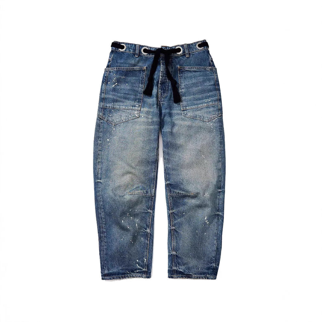 Jeans soltos de cordão de tinta de respingo com reviravolta casual artística