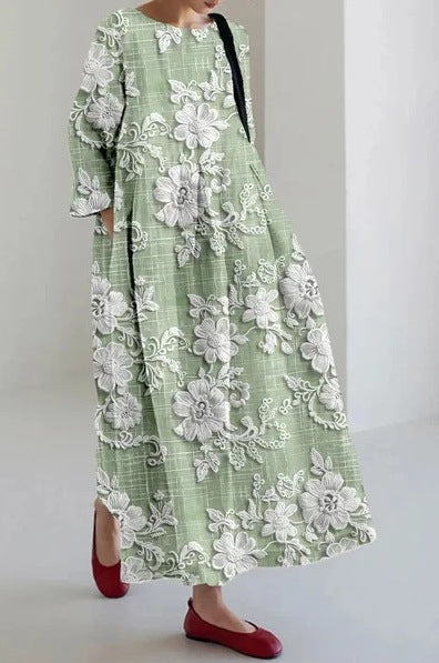Kreatives Dreiviertelhülsenblumenkleid mit entspannter Silhouette