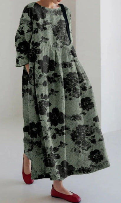 Kreatives Dreiviertelhülsenblumenkleid mit entspannter Silhouette