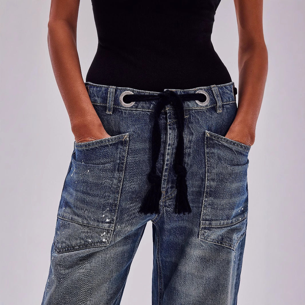Jeans soltos de cordão de tinta de respingo com reviravolta casual artística