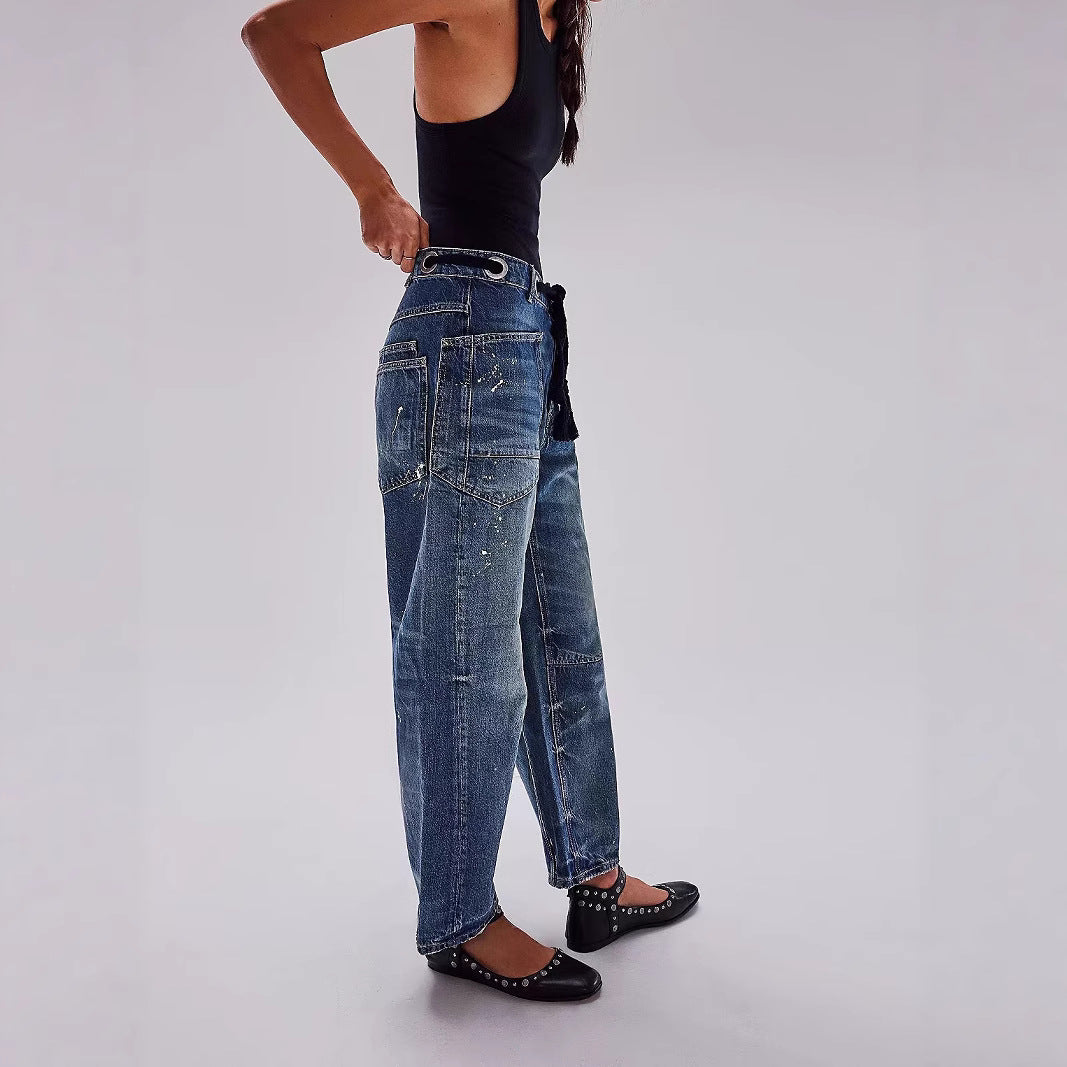 Jeans soltos de cordão de tinta de respingo com reviravolta casual artística