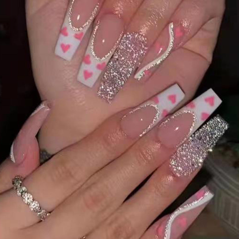 Dameskistvormige roze nagelset met grijs accent nagel