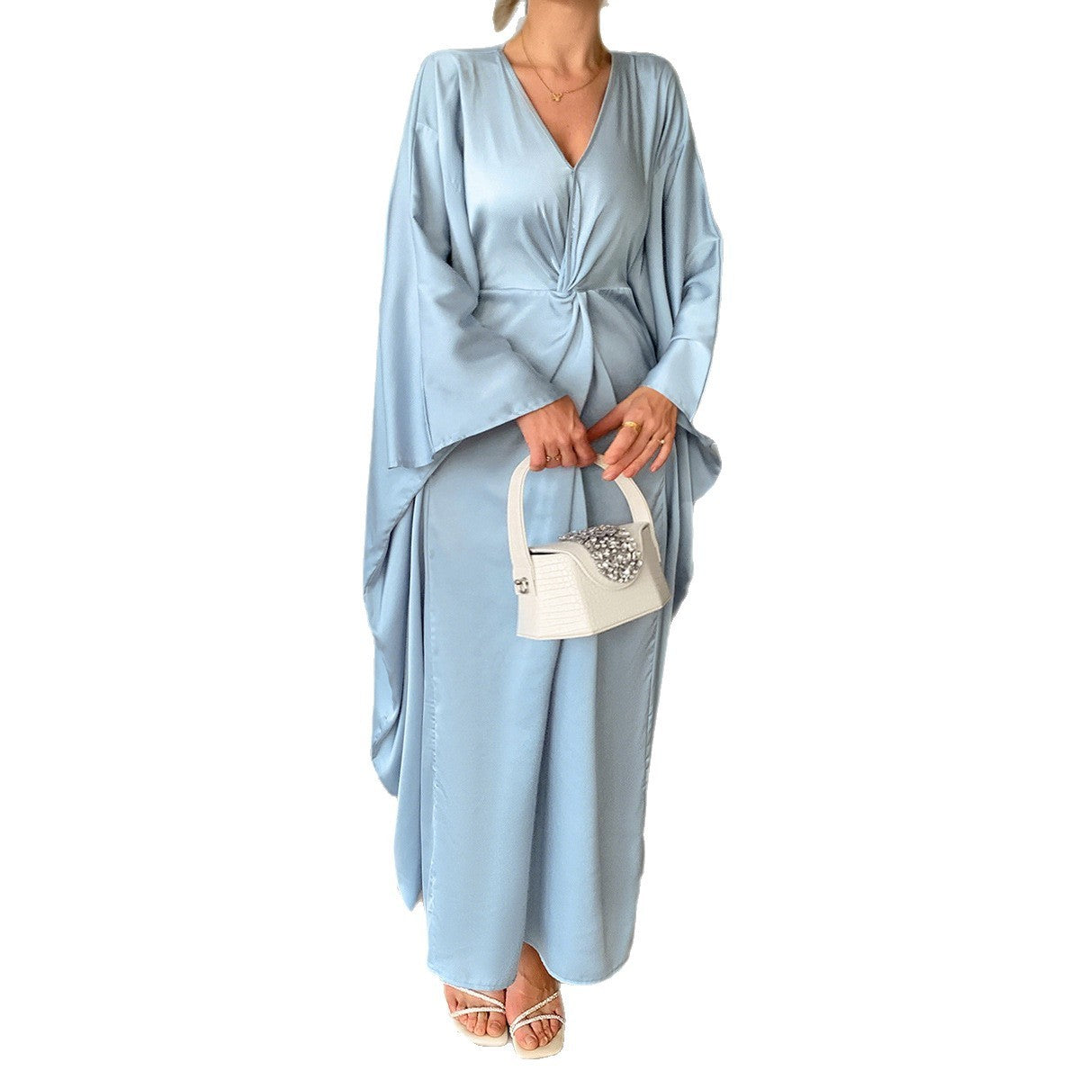 Maxi -jurk met een vaste kleur met lange mouwen met cinched taille -aantrekkingskracht