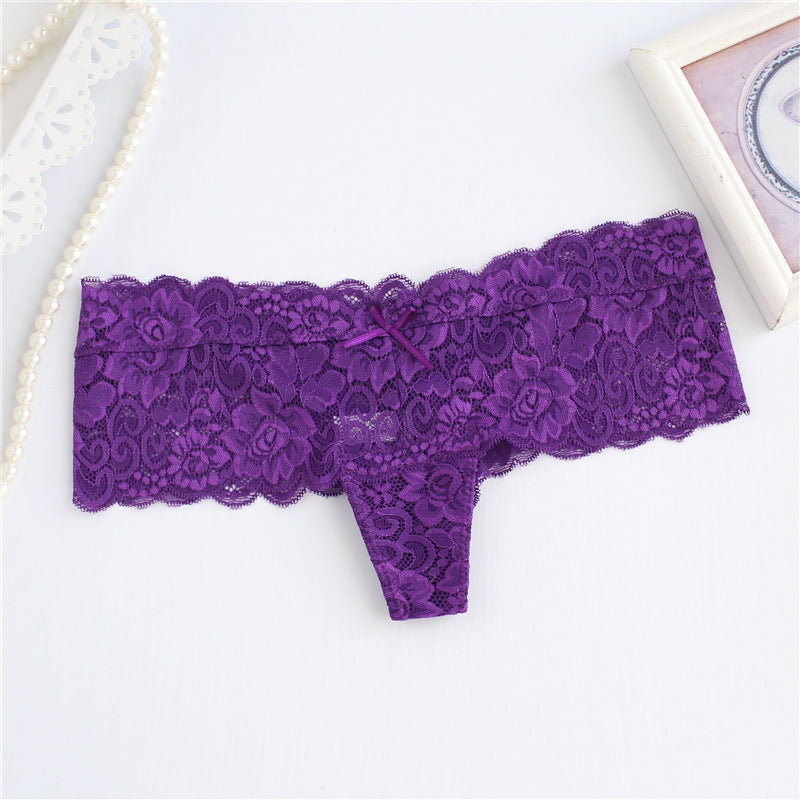 Panty de string de jupe large en dentelle florale