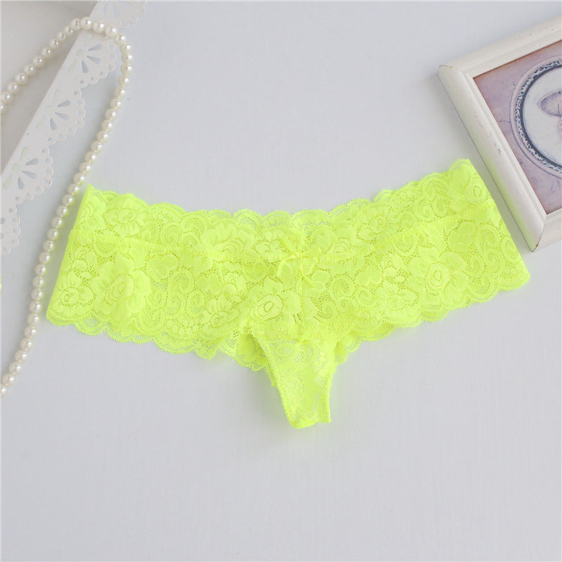 Panty de string de jupe large en dentelle florale