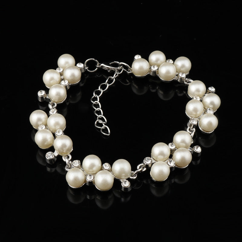 Bracelet en grappe de perles et en or