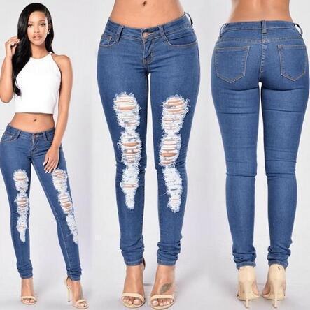 Jeans magri con lavaggio leggero strappato