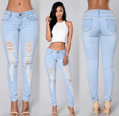 Jeans magri con lavaggio leggero strappato