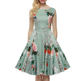 Mintgrünes Kleid mit Blumendruck