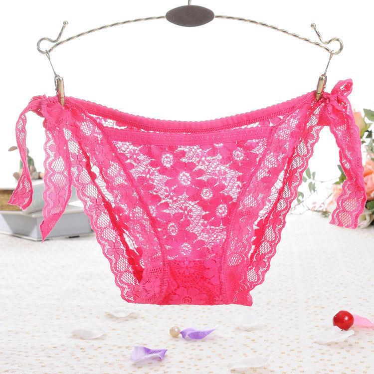 Panty de encaje transparente con lazo a la cadera